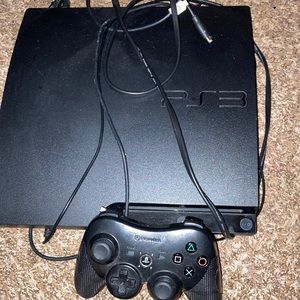 PS3 with cords and control